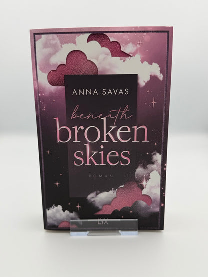 Beneath Broken Skies